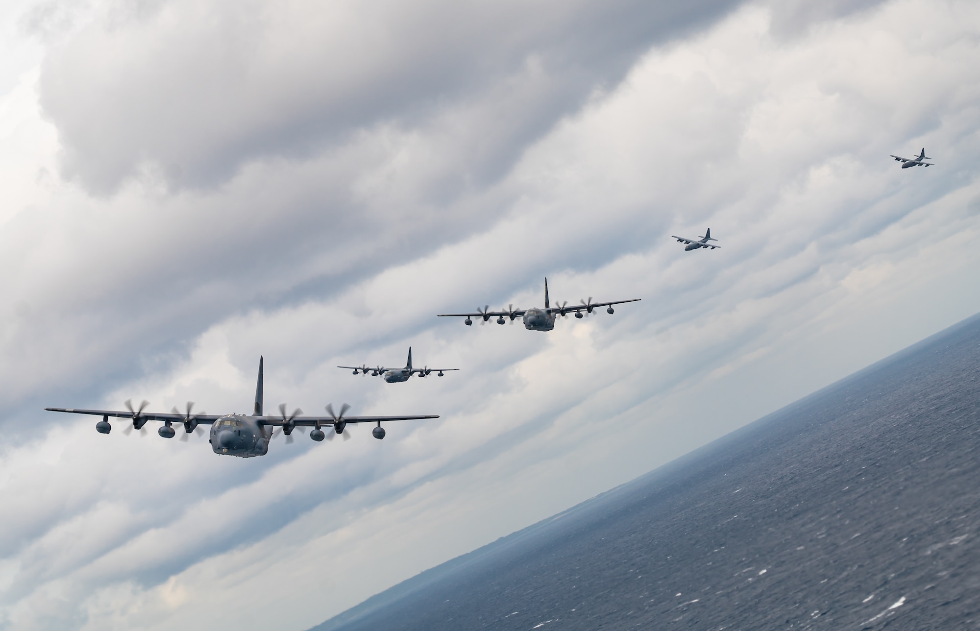 Planes fly off the coast of Okinawa, Japan.