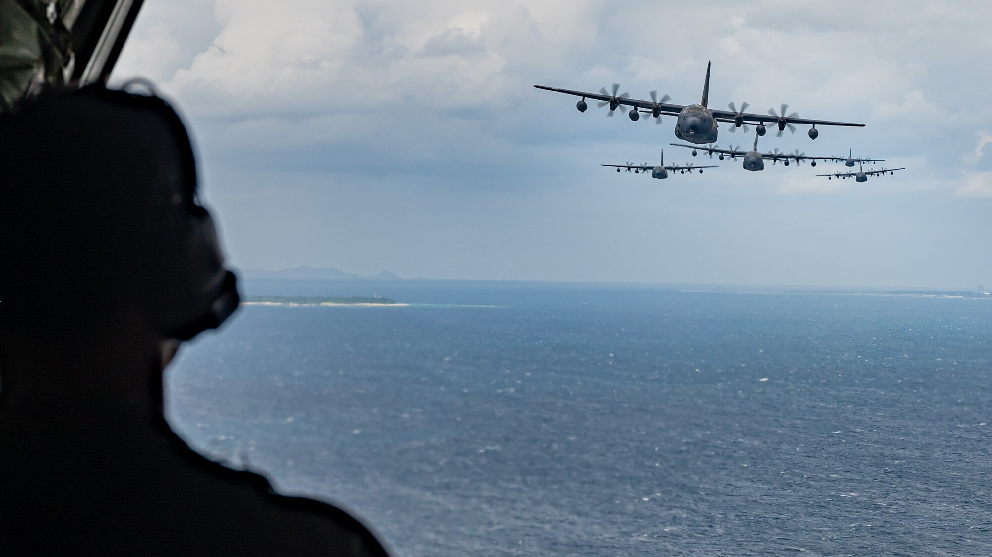 Planes fly off the coast of Okinawa, Japan.