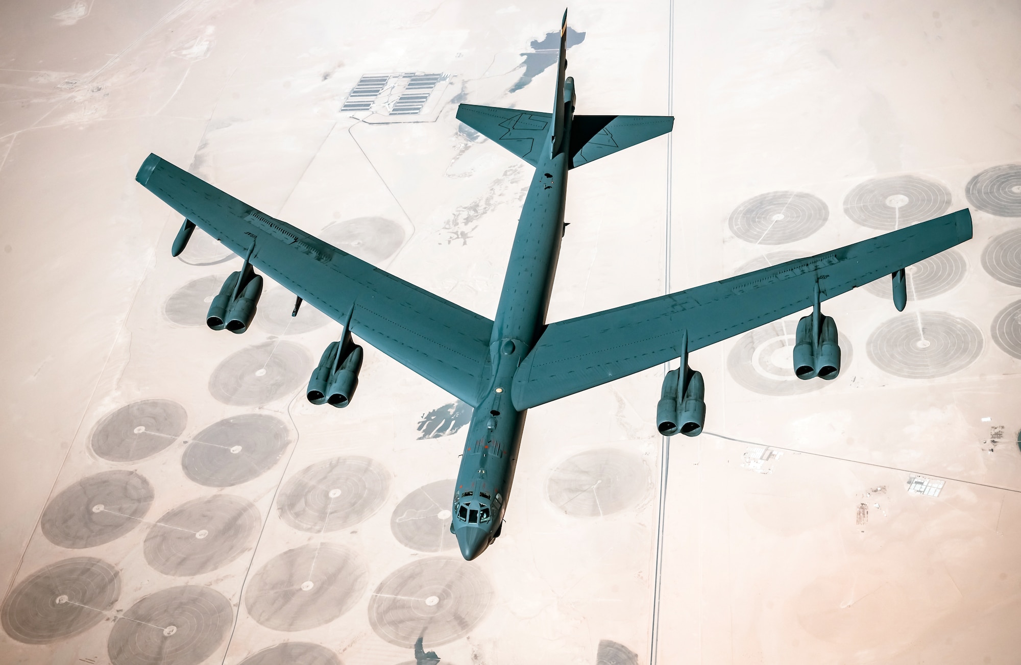 A U.S. Air Force B-52 Stratofortress from the 5th Bomb Wing, Minot Air Force Base, N.D., departs after receiving fuel from a U.S. Air Force KC-135 Stratotanker