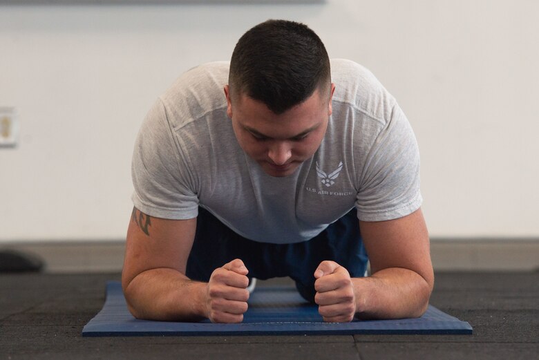 Staff Sgt. Nicholas Reynolds, a recruiter with the 157th Force Support Squadron, completes the newest exercise additions to the Air Force PT assessment.