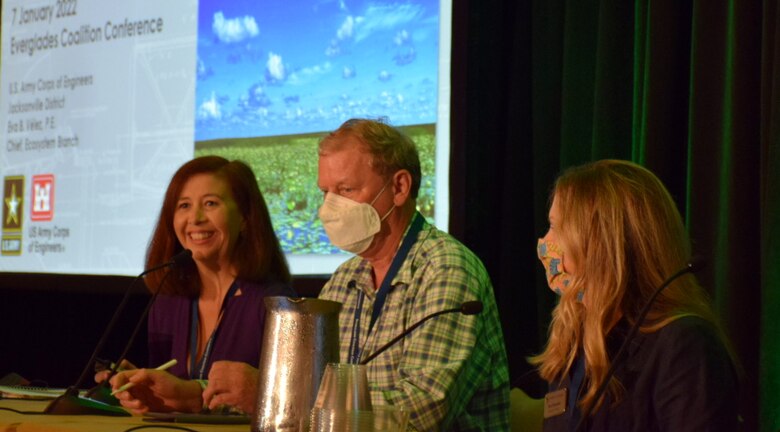 Eva Velez (left), the chief of the Ecosystem Branch of the U.S. Army Corps of Engineers Jacksonville District, prepares to speak during a panel discussion at the 37th Everglades Coalition Conference Jan. 7. Velez was joined at the table by Dr. Tom Van Lent (center), the senior scientist of the Everglades Foundation, and Eve Samples (right), the executive director Friends of the Everglades. The panel discussed the importance of water management across the entire Central and South Florida system, and particularly the efforts to produce a new Lake Okeechobee System Operating Manual that will provide significant improvements for stakeholders over the current Lake Okeechobee Regulation Schedule that was written in 2008.