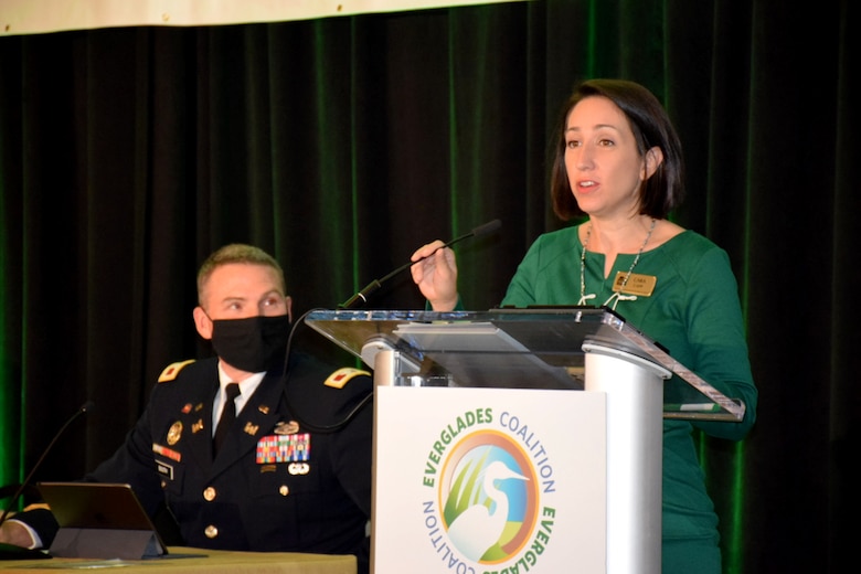 Col. James Booth, U.S. Army Corps of Engineers Jacksonville District commander, listens as moderator Cara Cap, the senior Everglades program manager for the National Parks Conservation Association, introduces the panel for the 37th Everglades Coalition Conference plenary session. The federal panel held Jan. 8 discussed federal policy and funding opportunities and provided a chance to review some of the momentum Everglades restoration has enjoyed recently, including two ribbon cutting ceremonies recognizing completed projects and a groundbreaking ceremony scheduled in February 2022.