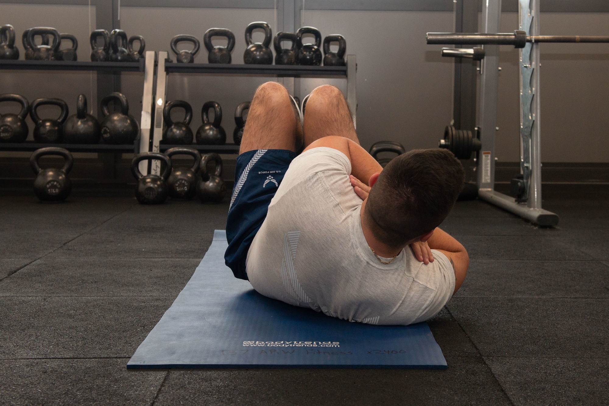 Staff Sgt. Nicholas Reynolds, a recruiter with the 157th Force Support Squadron, completes the newest exercise additions to the Air Force PT assessment.