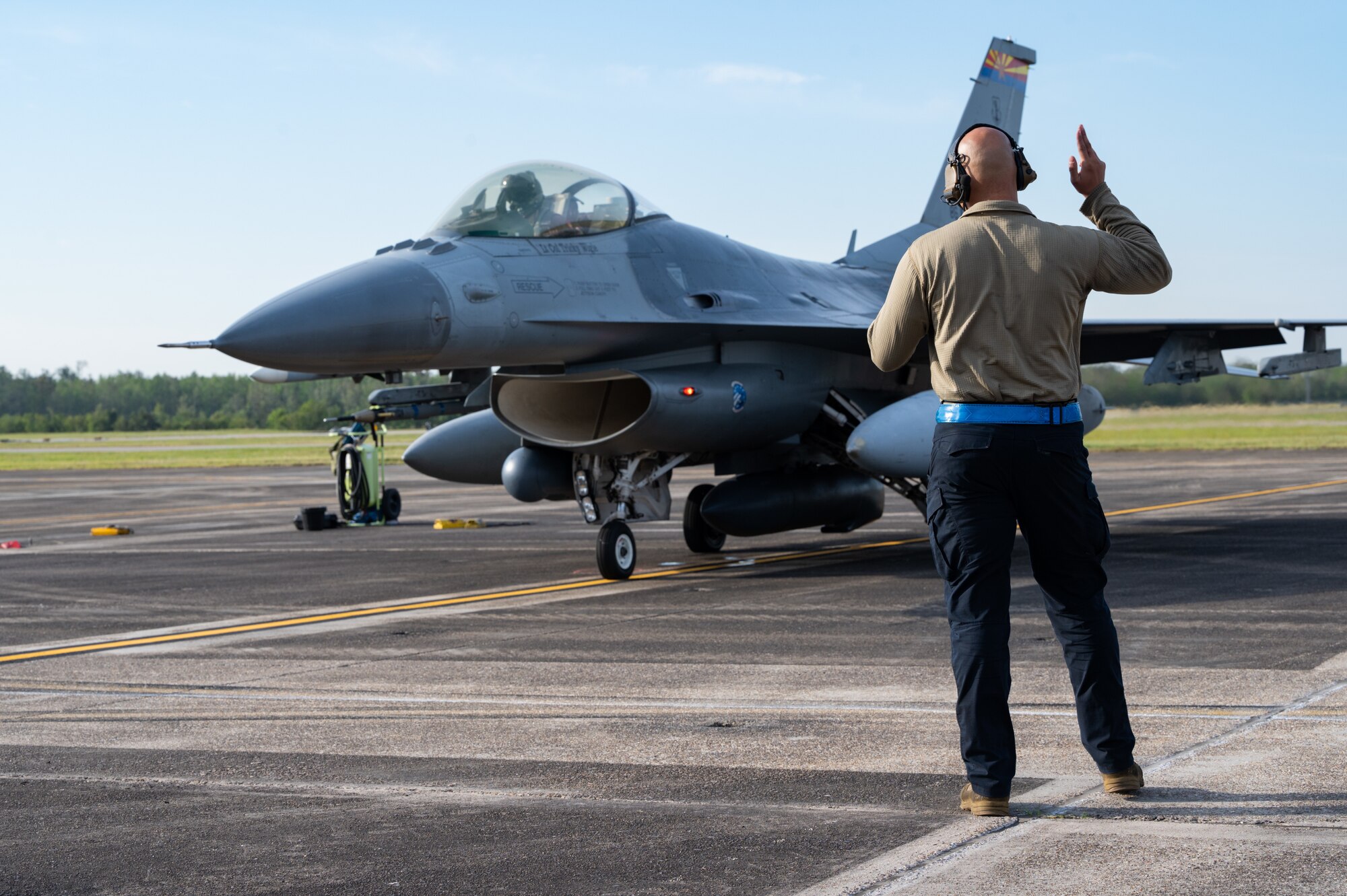 Staff Sgt. Austin Wall of the 162nd Wing, Arizona Air National Guard, launches an F-16 fighter aircraft at Naval Air Station Joint Reserve Base New Orleans, November 4 as part of operation Southern Lightning Strike. The Air National Guard led exercise allows units to deploy from their home bases to forward operating bases with minimum personnel and equipment to accomplish the mission in austere conditions. (U.S. Air National Guard Photo by Technical Sgt. H. Edward Stramler)