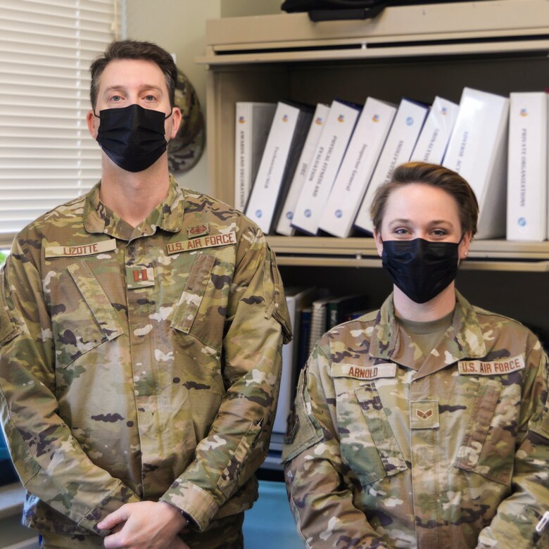 Capt. Andrew Lizotte, 157th Air Refueling Wing deputy staff judge advocate and chief of legal assistance, and Senior Airman Anna Arnold, 157th Air Refueling Wing paralegal, at work in the Pease legal office.