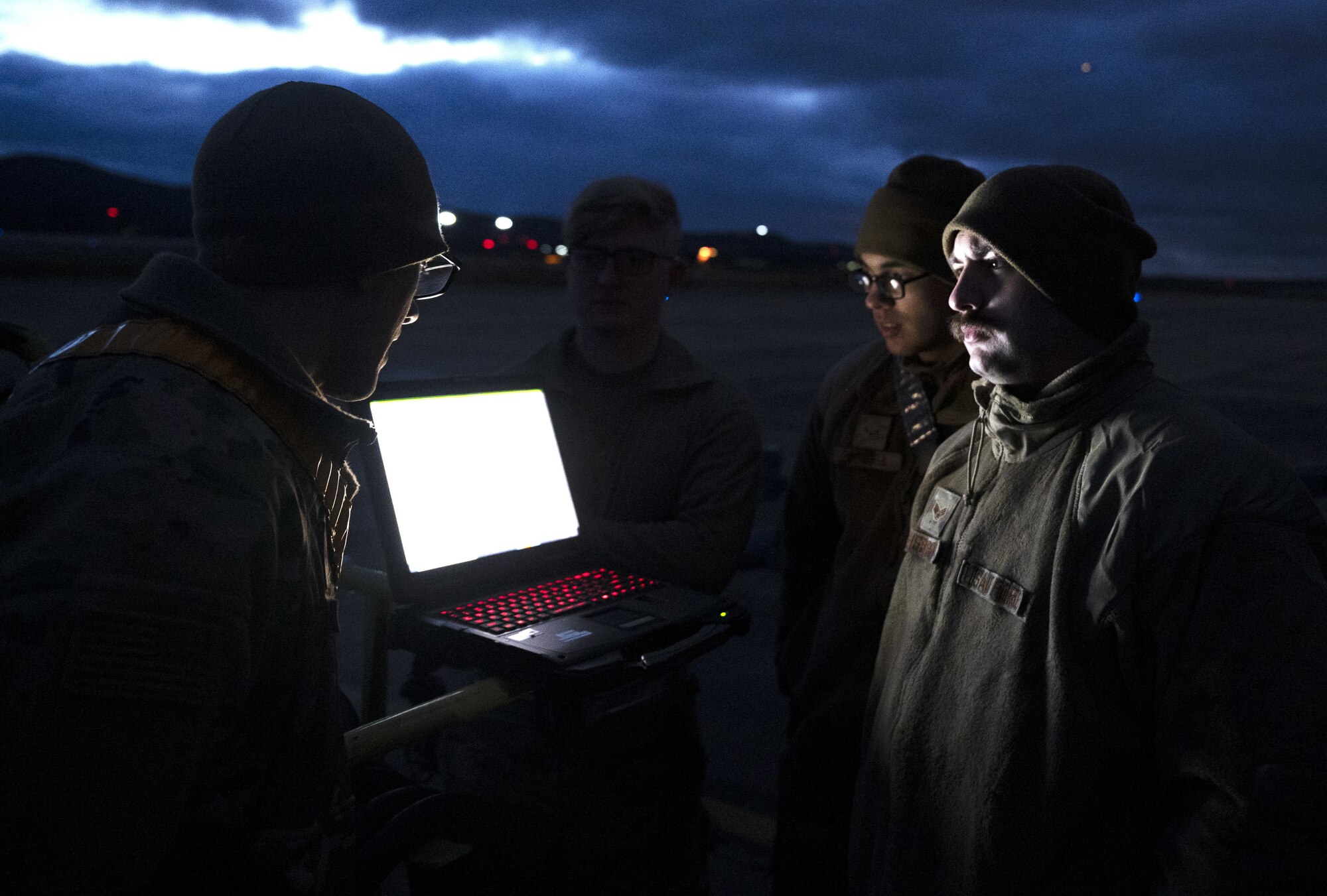 Airmen receive instructions on flightline.