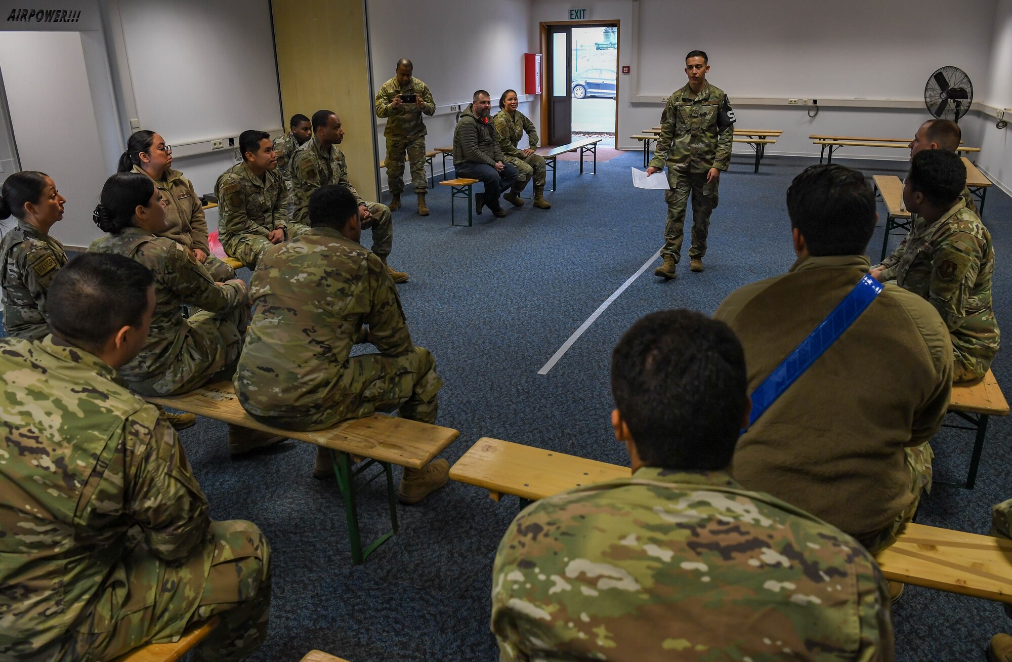 U.S. Air Force Staff Sgt. Madison Alicea, 569th United States Forces Police Squadron unit training instructor, provides 86th Maintenance Group Airmen with awareness about the direct impact that alcohol consumption has on various body compositions during a Wet Lab event at Ramstein Air Base, Germany, Dec. 16, 2021. The purpose of the Wet Lab event is to provide awareness to personnel on how the 569 USFPS conducts standard field sobriety tests to determine if people are driving under the influence in order to deter people from drinking and driving. (U.S. Air Force photo by Airman Jared Lovett)