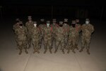 Newly pinned with orange ropes Airmen. Back row Instructor Tech. Sgt. Timothy Bilbrey, Airman 1st Class Maksim Chupakhin, Ashleigh Champagnie, Dakota Richardson, Nathan Steyn, Instructor Master Sgt. Brian Hermes. Front row, Instructor Staff Sgt. Austin Jur, Airmen Mason Dowd, Jaime Lamus, Brett Lucas, at the Medical Education and Training Campus, Joint Base San Antonio-Fort Sam Houston, Texas, Dec. 17, 2021. The focus of the Orange Rope program is to establish an innovative mindset for students. (U.S. Air Force photo by Cesar Rodriguez)