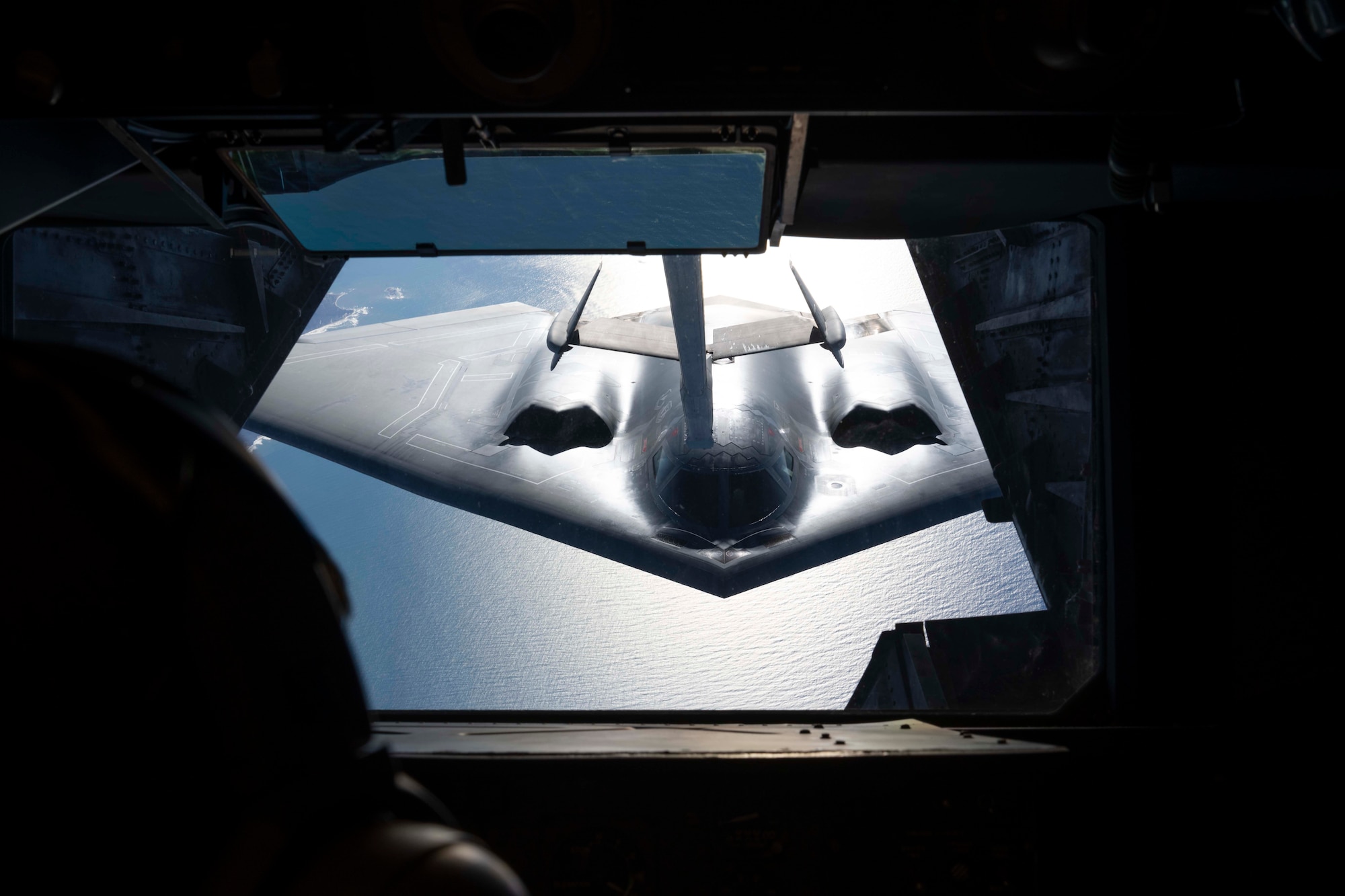 U.S. Air Force Staff Sgt. Taylor Dickson, 70th Aerial Refueling Squadron KC-10 Extender boom operator, operates the boom stick of a KC-10 Jan. 1, 2022, over southern California. The 70th ARS and 79th ARS offloaded 55,000 pounds of fuel to a B-2 spirit bomber in support of a flyover at the Rose Bowl and Tournament of Roses parade in Pasadena California. (U.S. Air Force photo by Senior Airman Alexander Merchak)