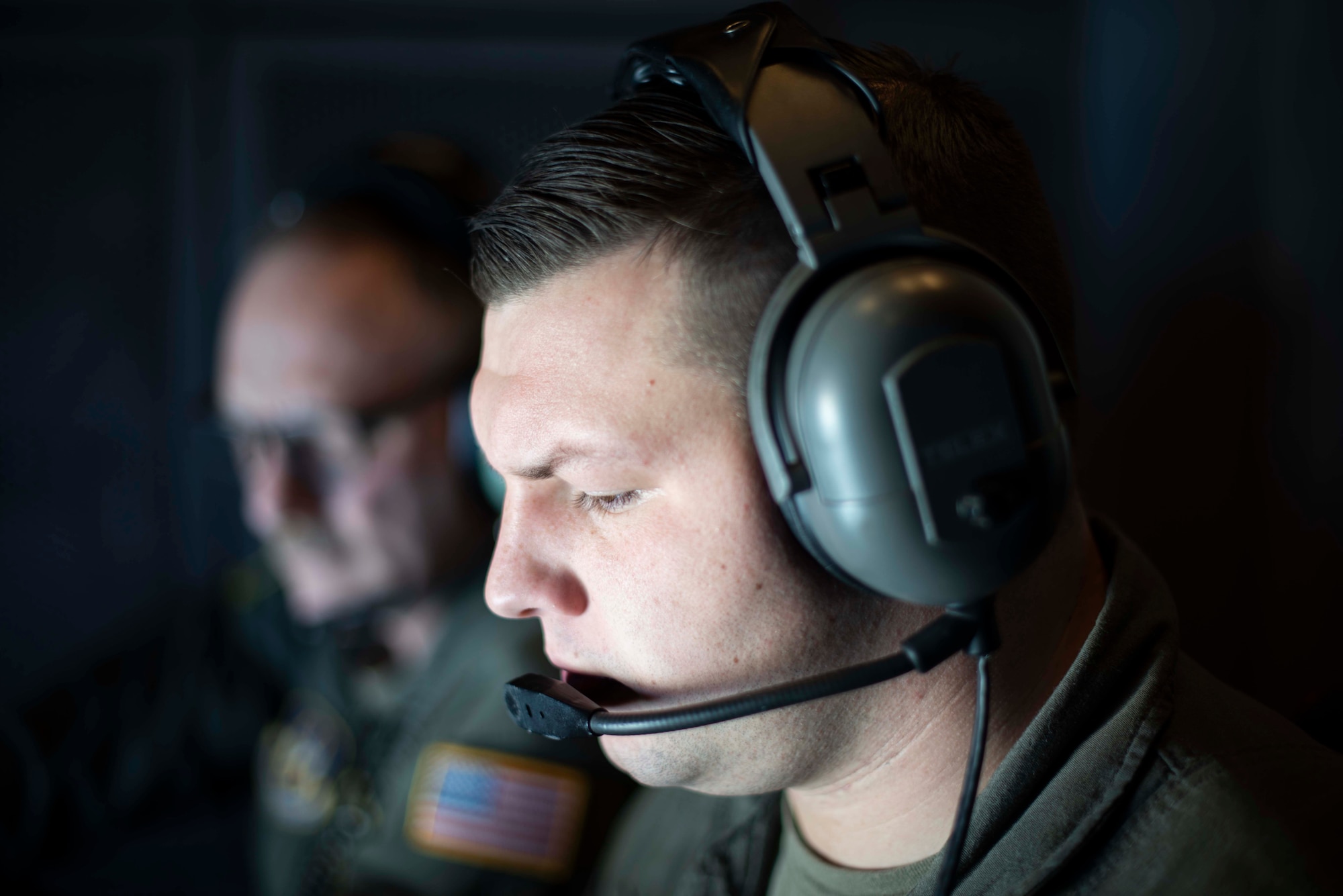 U.S. Air Force Staff Sgt. Taylor Dickson, 70th Aerial Refueling Squadron KC-10 Extender boom operator, operates the boom stick of a KC-10 Jan. 1, 2022, over southern California. The 70th ARS and 79th ARS offloaded 55,000 pounds of fuel to a B-2 spirit bomber in support of a flyover at the Rose Bowl and Tournament of Roses parade in Pasadena California. (U.S. Air Force photo by Senior Airman Alexander Merchak)