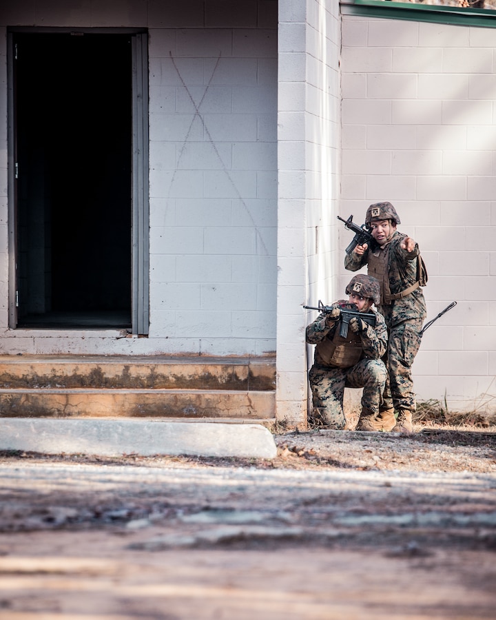 Marines with Echo Company, 2nd Battalion, 23rd Marine Regiment, 4th Marine Division, undergo combat exercises inside a military operations in urban terrain (MOUT) training village at Fort Pickett, Virginia on Jan. 9, 2022. MOUT villages simulate the urban landscape Marines can find themselves in while operating within close-quarters environments. The Department of Defense, through the U.S. Northern Command, and in support of the Department of Homeland Security, is providing transportation, temporary housing, medical screening, and general support for at least 50,000 Afghan evacuees at suitable facilities, in permanent or temporary structures, as quickly as possible. This initiative provides Afghan personnel essential support at secure locations outside Afghanistan. (U.S. Marine Corps photo by Lance Cpl. David Intriago)