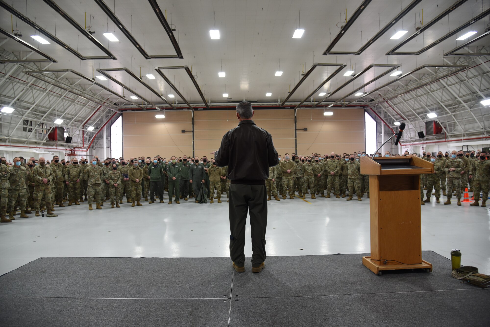 Col. William McCrink III, speaks to Airmen assigned to the New York Air National Guard's 174th Attack Wing during a Wing "All Call" on December 5, 2021 at Hancock Field Air National Guard Base in Syracuse ,New York as he announces that the wing has received the Air Force Outstanding Unit Award. The award was for the period period of Jan.1, 2020 through Dec. 31, 2020.