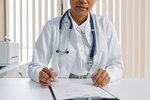 Doctor sitting at desk