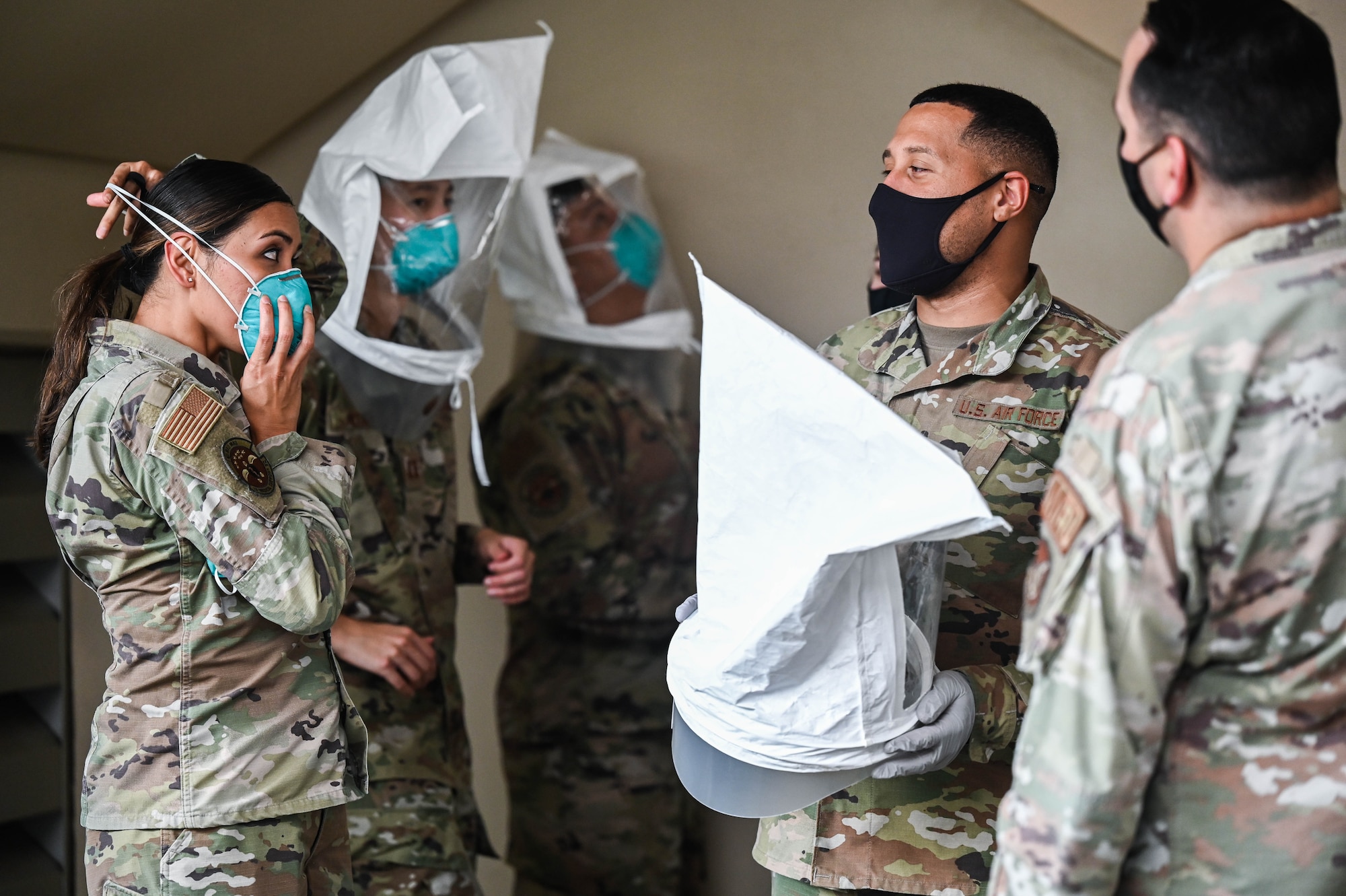 Airmen assigned to the 15th Operational Medical Readiness Squadron bioenvironmental flight perform N95 mask fit test on 15th Medical Group personnel at Joint Base Pearl Harbor-Hickam, Hawaii, Jan. 7, 2022. Fit tests were performed to ensure medical personnel are properly wearing personal protective equipment while conducting patient care during the current pandemic. (U.S. Air Force photo by Staff Sgt. Alan Ricker)