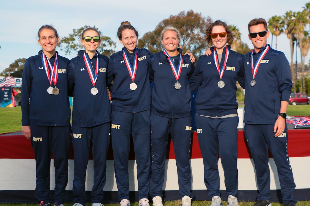 Navy women take team silver during the 2022 Armed Forces Cross Country Championship held in conjunction with the USA Track and Field National Cross Country Championship at Mission Bay Park in San Diego, Calif. on January 8th.  Runners from the Marine Corps, Navy (with Coast Guard) and Air Force compete for gold.  (Department of Defense Photo - Released)