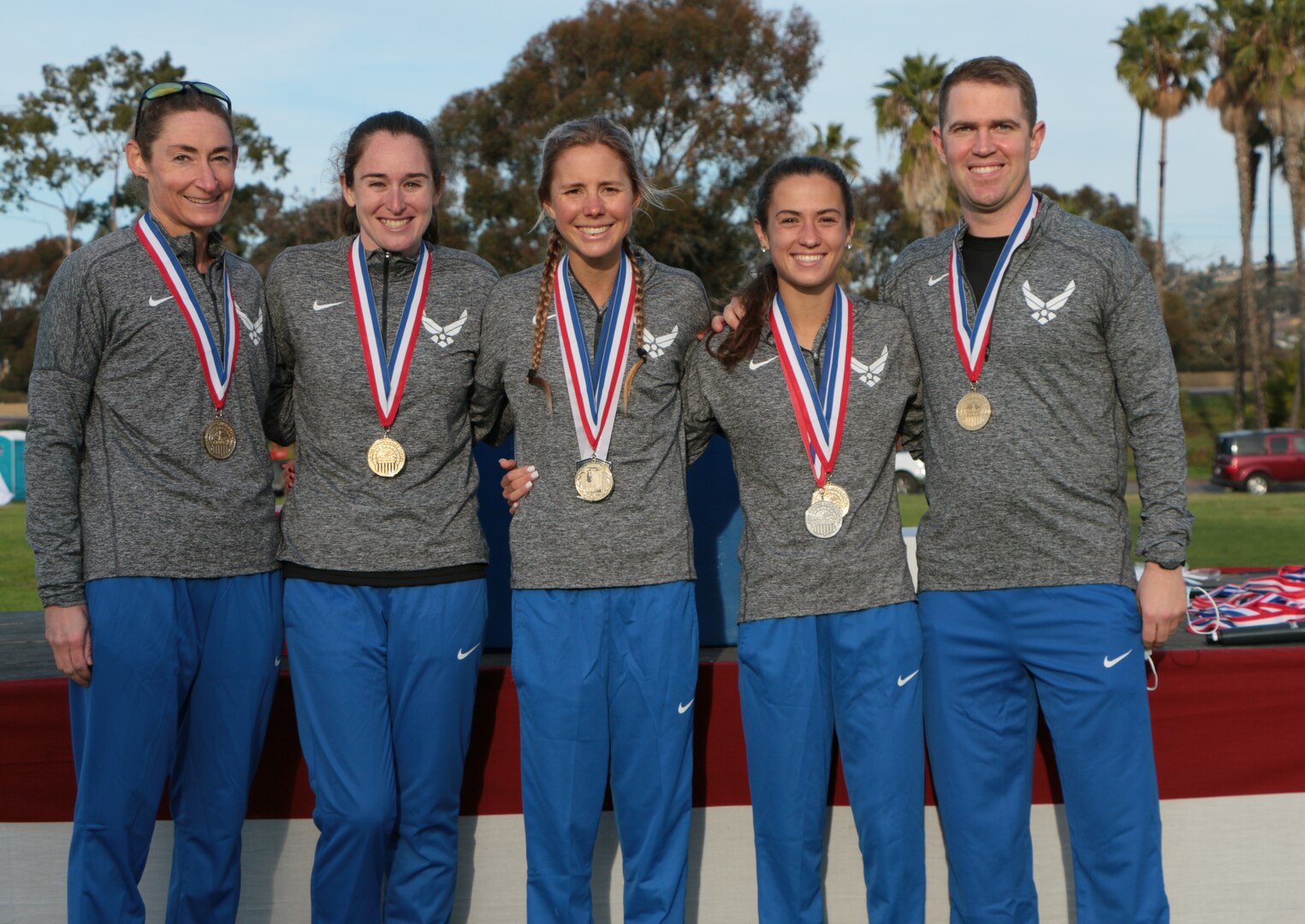 Air Force women win team gold during the 2022 Armed Forces Cross Country Championship held in conjunction with the USA Track and Field National Cross Country Championship at Mission Bay Park in San Diego, Calif. on January 8th.  Runners from the Marine Corps, Navy (with Coast Guard) and Air Force compete for gold.  (Department of Defense Photo - Released)