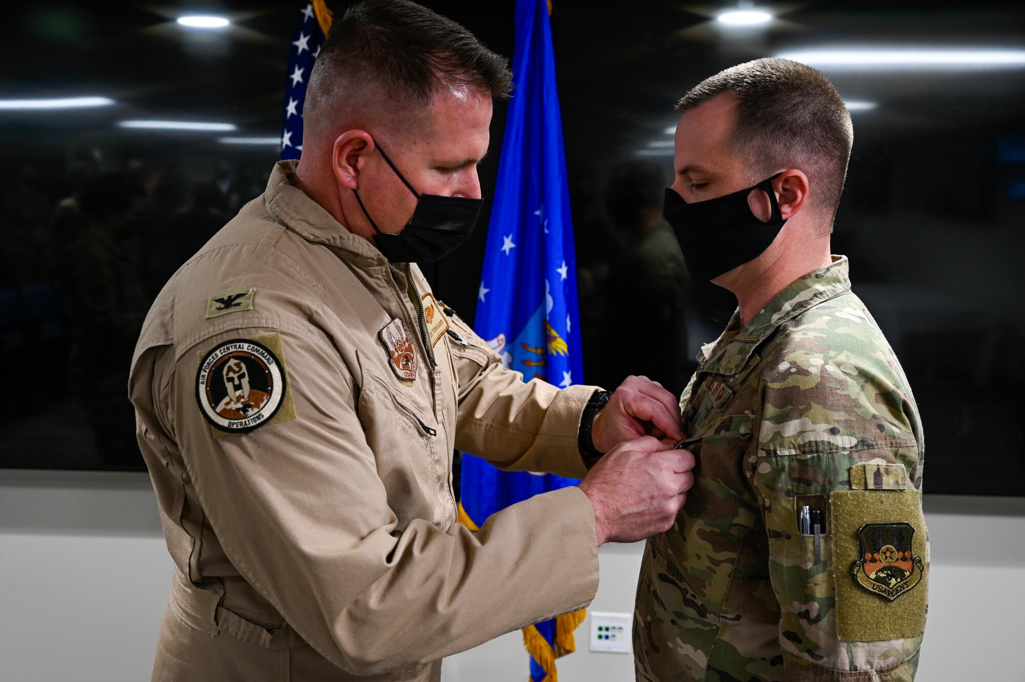 A photo of an airman receiving an award