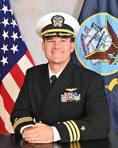 COMMANDER GREGORY M. VALDEZ