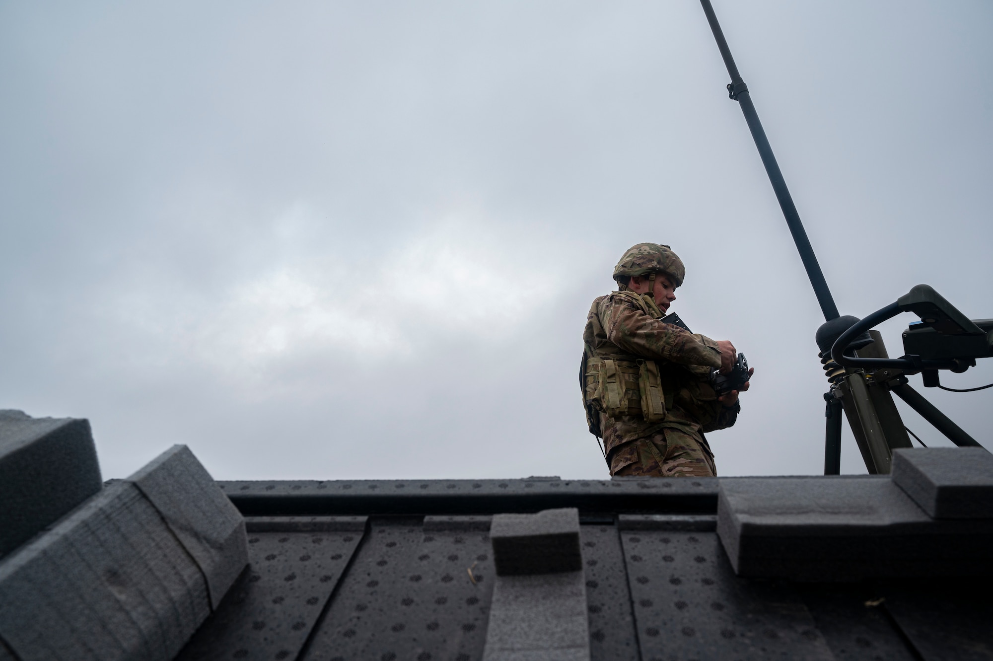 man standing on a building