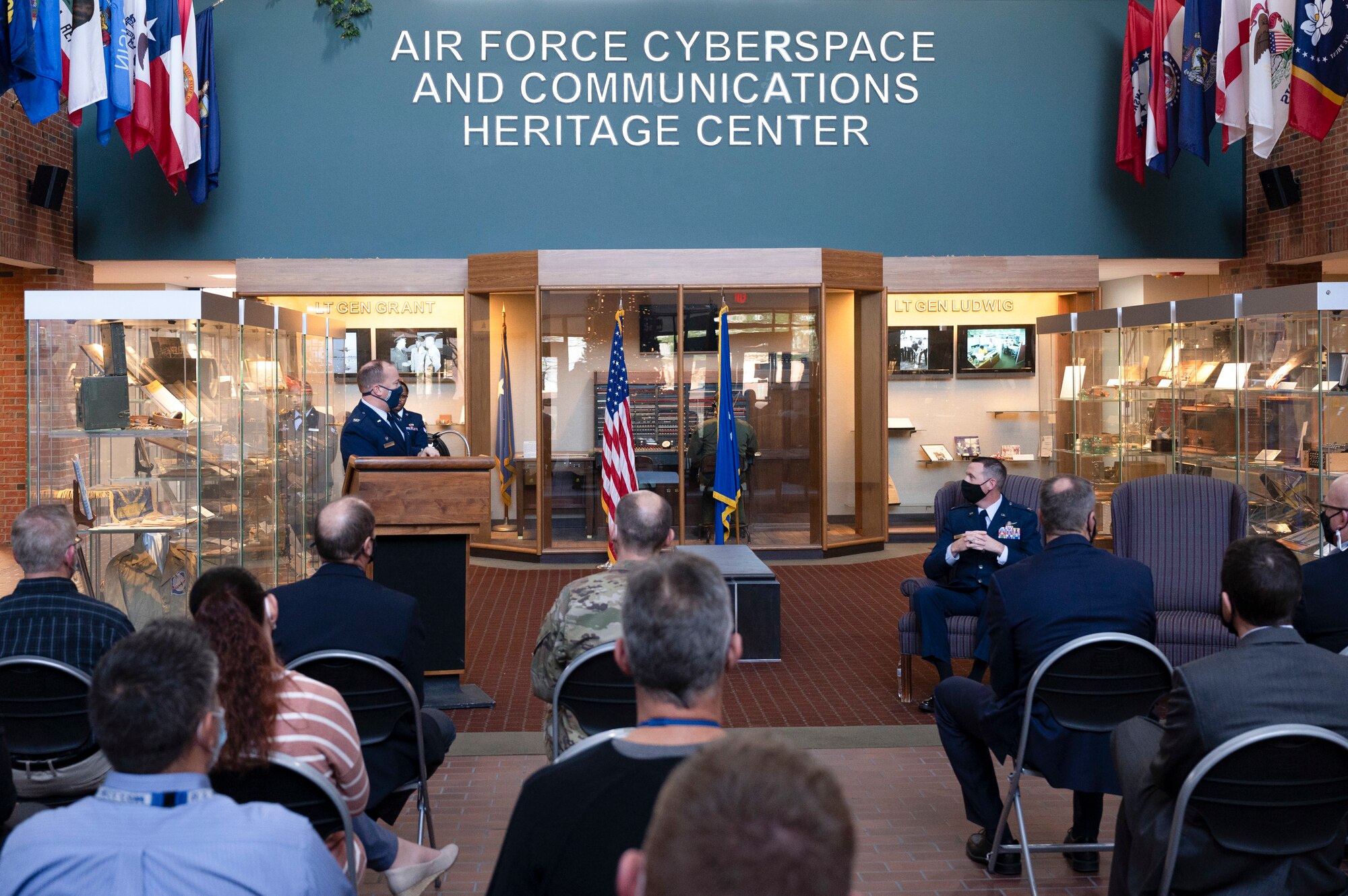 Col. Kevin Kirsch, HQ Cyberspace Capabilities Center commander, talks about the accomplishments of the Executive Airlift Communications Network team during a ceremony at the Air Force Cyberspace and Communications Heritage Center at Scott Air Force Base, Illinois, Jan. 4, 2021. The EACN team were tasked with improving in-flight communications and capabilities that support senior leadership. (U.S. Air Force photo by Staff Sgt. Dalton Williams)