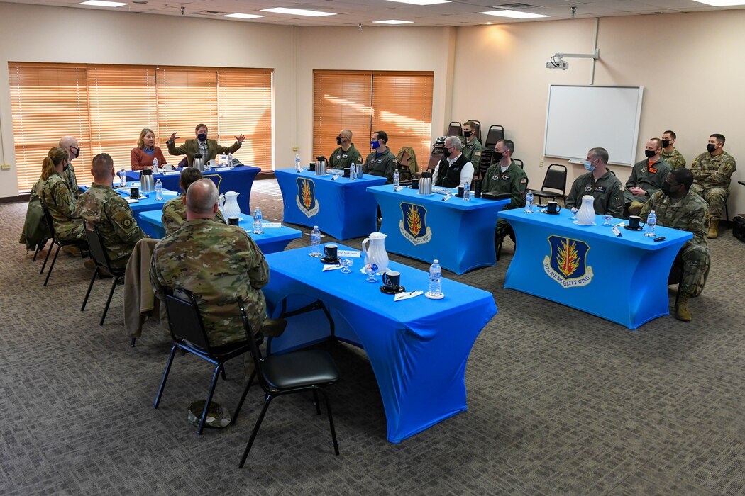 Leaders from the 97th Air Mobility Wing (AMW) sit in on a briefing with U.S. Air Force Lt. Gen. (Ret.) Michelle Johnson and her husband, John Hargreaves, on Altus Air Force Base, Oklahoma, Jan. 7, 2022. Johnson and Hargreaves had the opportunity to tour the base and see firsthand how the 97th AMW’s mission is carried out. (U.S. Air Force photo by Airman 1st Class Trenton Jancze)