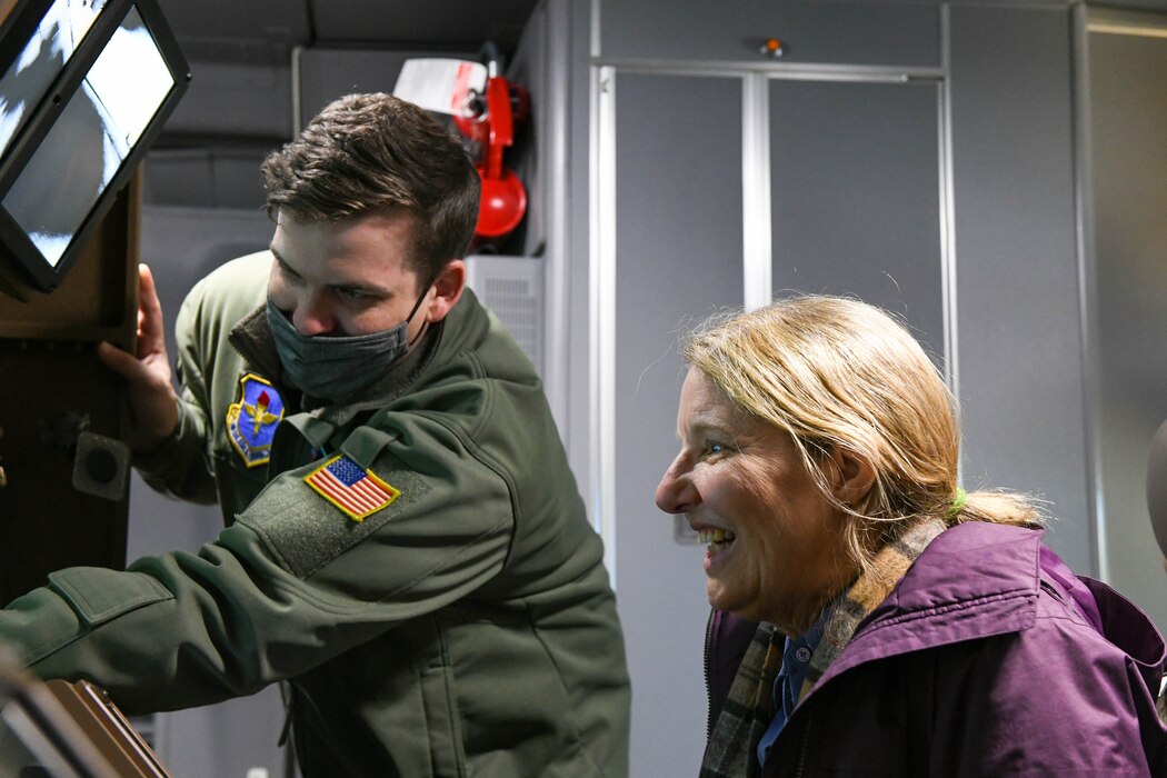 U.S. Air Force Tech. Sgt. Grant Villwock, 56th Air Refueling Squadron boom operator instructor, explains the Tactical Situation Awareness System (TSAS) for Lt. Gen. (Ret.) Michelle Johnson on Altus Air Force Base, Oklahoma, Jan. 7, 2022. The TSAS allows for better battle readiness while still being versatile in the air. (U.S. Air Force photo by Airman 1st Class Trenton Jancze)