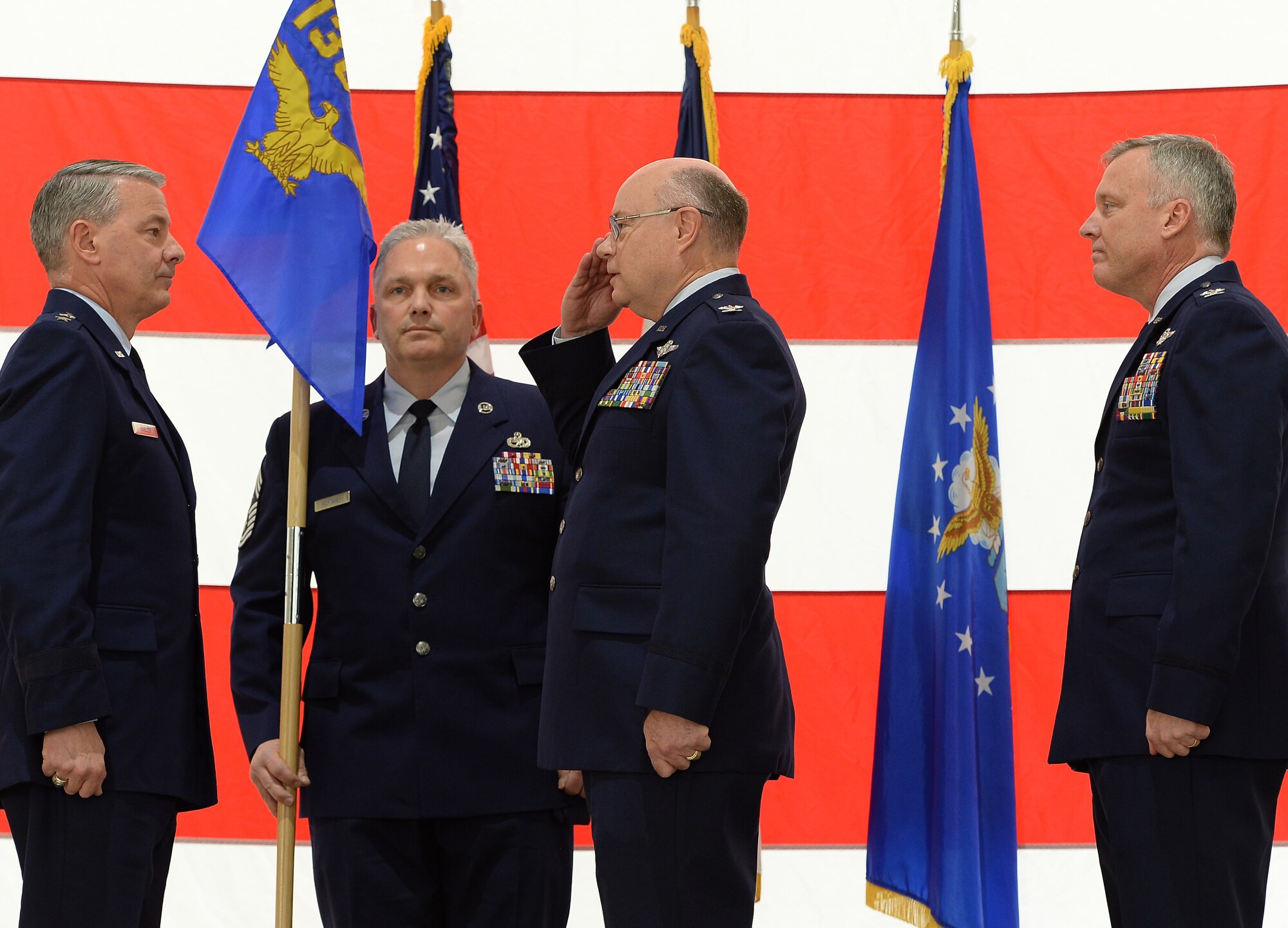Col Williams salutes Maj Gen Suelzer after relinquishing his command and retiring.