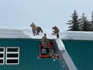 Alaska National Guard Soldiers and Airmen provide emergency assistance in the Southeast Alaska community of Yakutat, Jan. 12, 2022, after the region received tremendous amounts of snow and rain over a seven-day period. Guard members serving on Joint Task Force-Yakutat will provide building safety assessments and emergency snow removal for Tribal, public and government facilities in the community following hazardous winter weather and heavy snowfall resulting in building damage and continued risk of unsafe conditions. Yakutat is in the Tongass National Forest, the largest National Forest in the U.S. and home to the largest population of bald eagles in the world. The Alaska National Guard is trained, equipped and ready to provide disaster response support for the State of Alaska when requested by civil authorities. (U.S. Army National Guard photo by Dana Rosso)