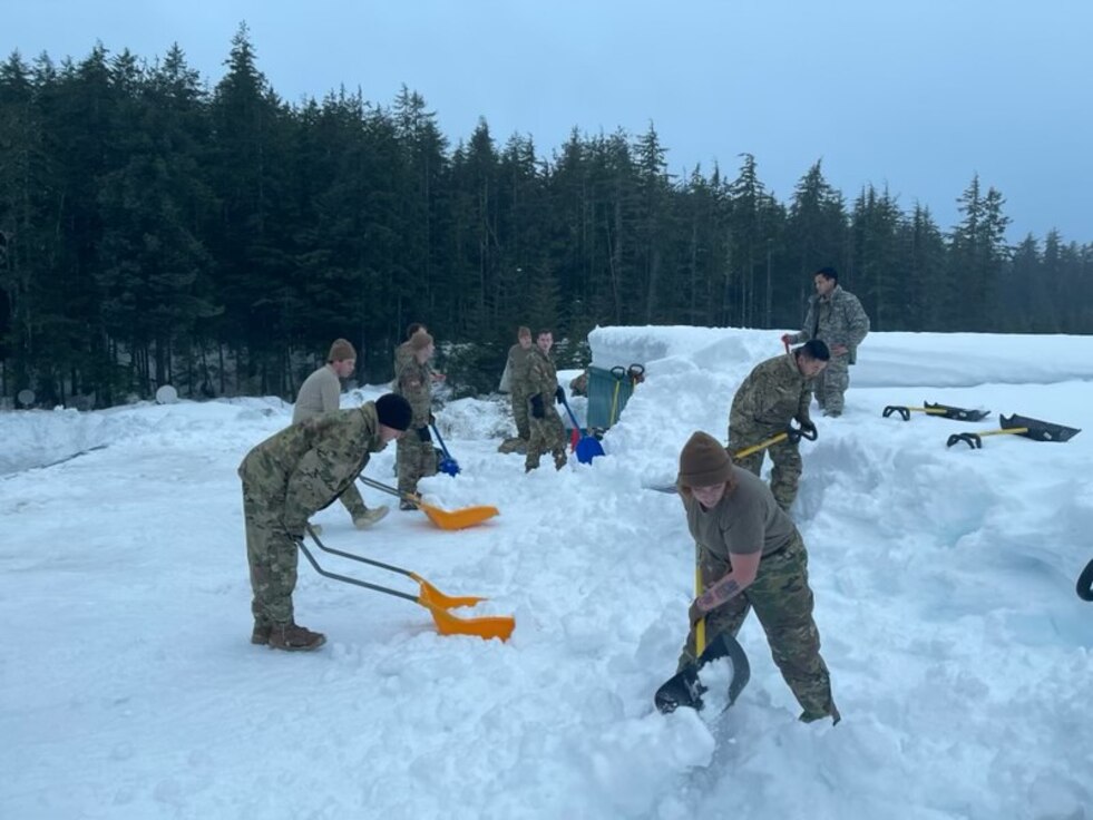 Alaska National Guard Soldiers and Airmen provide emergency assistance in the Southeast Alaska community of Yakutat, Jan. 12, 2022, after the region received tremendous amounts of snow and rain over a seven-day period. Guard members serving on Joint Task Force-Yakutat will provide building safety assessments and emergency snow removal for Tribal, public and government facilities in the community following hazardous winter weather and heavy snowfall resulting in building damage and continued risk of unsafe conditions. Yakutat is in the Tongass National Forest, the largest National Forest in the U.S. and home to the largest population of bald eagles in the world. The Alaska National Guard is trained, equipped and ready to provide disaster response support for the State of Alaska when requested by civil authorities. (U.S. Army National Guard photo by Dana Rosso)
