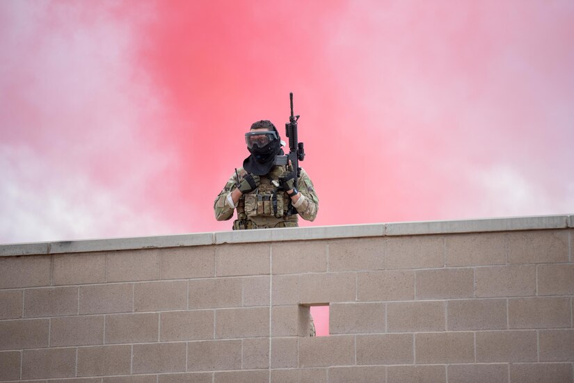 Tech Sgt. David Getty, fireteam member in the Kentucky Air National Guard’s 123rd Security Forces Squadron, executes a simulated mission in a urban environment at Fort Carson, Colo., May 23, 2021. More than 30 Airmen from the unit travelled here to strengthen their specialized skills during nine days of field exercises at several different ranges. (U.S. Air National Guard photo by Phil Speck)