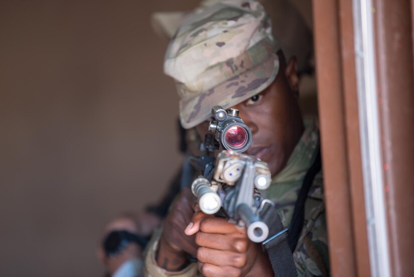 Airman 1st Class Emmanuel Collins, a fireteam member in the Kentucky Air National Guard’s 123rd Security Forces Squadron, practices moving in a domestic operations environment at Fort Carson, Colo., May 22, 2021. More than 30 Airmen from the unit travelled here to strengthen their specialized skills during nine days of field exercises at several different ranges. (U.S. Air National Guard photo by Phil Speck)