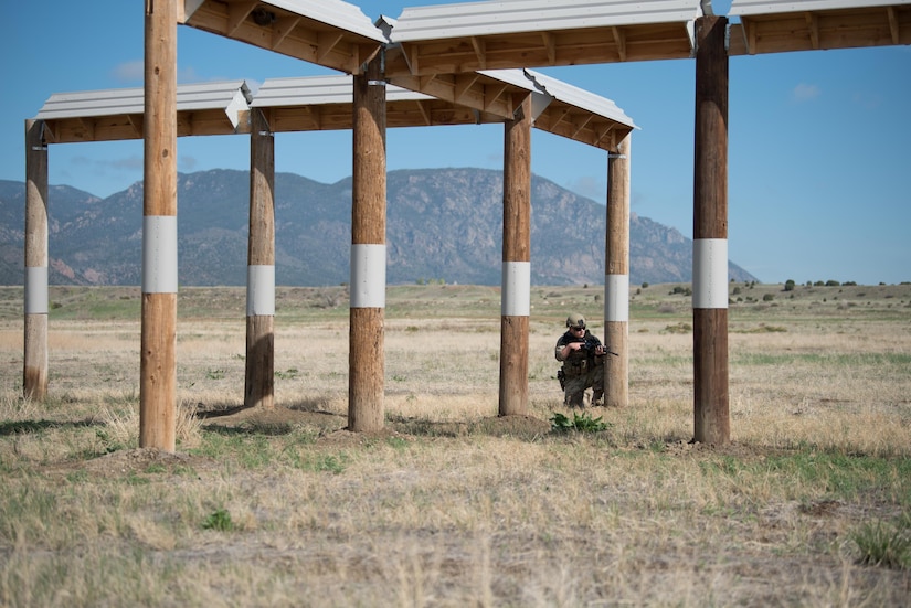 Staff Sgt. William Terpstra, fireteam leader in the Kentucky Air National Guard’s 123rd Security Forces Squadron, takes up a defensive posture during a field training exercise at Fort Carson, Colo., May 19, 2021. More than 30 Airmen from the unit travelled here to strengthen their specialized skills during nine days of field exercises at several different ranges. (U.S. Air National Guard photo by Phil Speck)