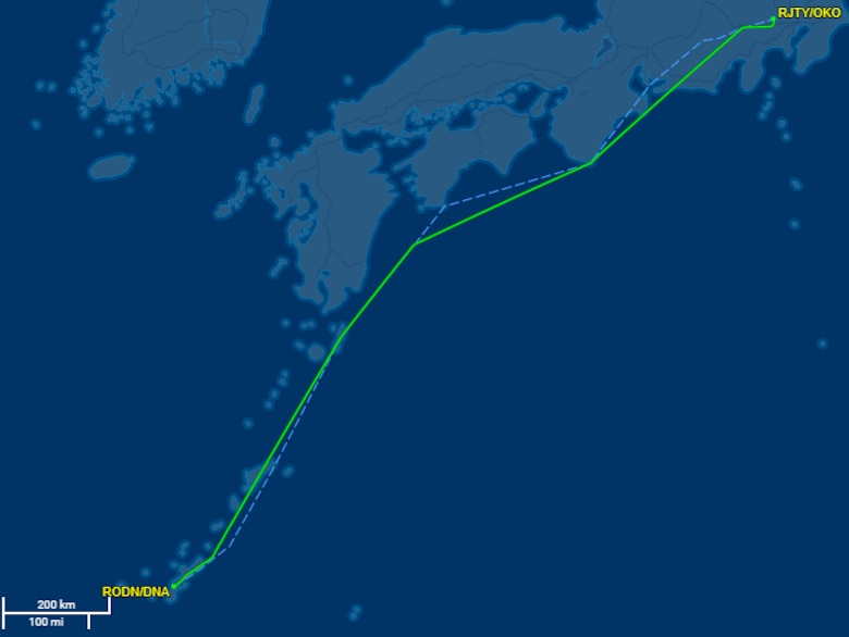 A top-down graphic of Japan with a bright line marking a flight path.