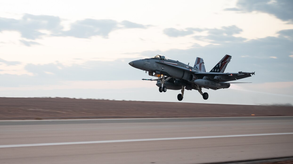 A U.S. Marine Corps F/A-18 Hornet takes off from Prince Sultan Air Base, Kingdom of Saudi Arabia, Jan. 4, 2022. The Hornet is deployed from the Marine Fighter Attack Squadron 115 (VMFA-115) and its mission involves flying and interoperating with a variety of U.S. Air Force aircraft in order to strengthen the unit’s ability to operate in a complex air environment. . (U.S. Air Force photo by Senior Airman Jacob B. Wrightsman)
