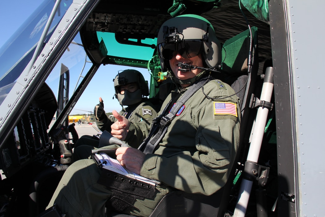 Air Force Lt. Gen. Marshall B. “Brad” Webb, commander of Air Education and Training Command, and Capt. Austin Kong, 23rd FTS instructor pilot, prepare for takeoff in a TH-1H Huey