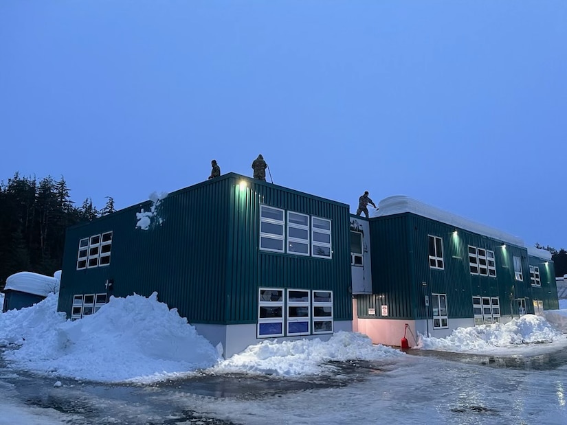 Alaska National Guard Soldiers and Airmen provide emergency assistance in the Southeast Alaska community of Yakutat, Jan. 13, 2022, after the region received tremendous amounts of snow and rain over a seven-day period. Guard members serving on Joint Task Force-Yakutat will provide building safety assessments and emergency snow removal for Tribal, public and government facilities in the community following hazardous winter weather and heavy snowfall resulting in building damage and continued risk of unsafe conditions. Yakutat is in the Tongass National Forest, the largest National Forest in the U.S. and home to the largest population of bald eagles in the world. The Alaska National Guard is trained, equipped and ready to provide disaster response support for the State of Alaska when requested by civil authorities. (U.S. Army National Guard photo by Dana Rosso)