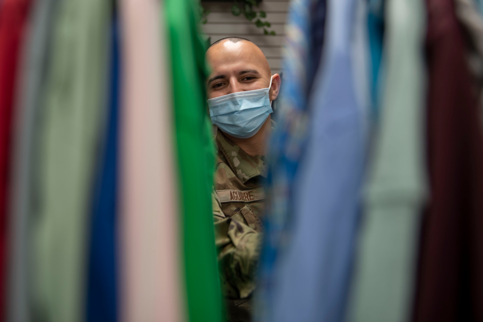 Airman Ray Aguirre, 4th Logistics Readiness Squadron supply technician, shops for clothes at the Airman’s Attic at Seymour Johnson Air Force Base, N.C., Jan. 6, 2022. The Airman’s Attic provides free items such as clothing, household goods, infant supplies, furniture and educational supplies to service members. (U.S Air Force photo by Airman 1st Class Sabrina Fuller)