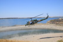a UH-1N Huey receives a heritage paint job to honor its service during the Vietnam War.