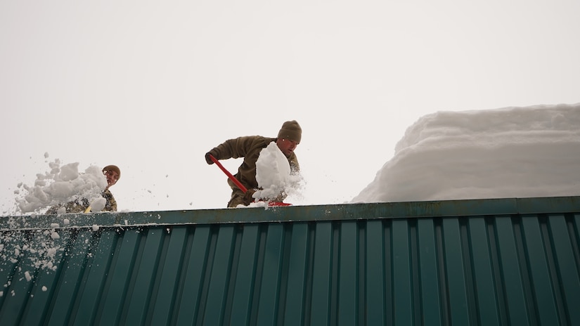 Alaska National Guard Soldiers and Airmen provide emergency assistance in the Southeast Alaska community of Yakutat, Jan. 12, 2022, after the region received tremendous amounts of snow and rain over a seven-day period. Guard members serving on Joint Task Force-Yakutat will provide building safety assessments and emergency snow removal for Tribal, public and government facilities in the community following hazardous winter weather and heavy snowfall resulting in building damage and continued risk of unsafe conditions. Yakutat is in the Tongass National Forest, the largest National Forest in the U.S. and home to the largest population of bald eagles in the world. The Alaska National Guard is trained, equipped and ready to provide disaster response support for the State of Alaska when requested by civil authorities. (U.S. Army National Guard photo by Dana Rosso)