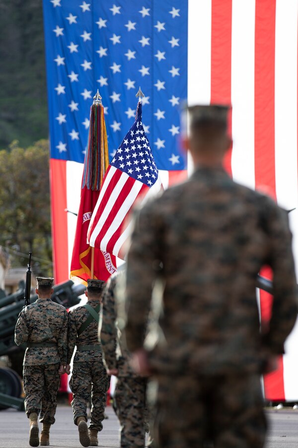 U.S. Marines with 11th Marine Regiment, 1st Marine Division, stand in formation prior to a battle colors ceremony at Marine Corps Base Camp Pendleton, California, Jan. 12, 2022. Veterans and active duty Marines and Sailors attended the annual ceremony to pay tribute to the Marines that have served with the regiment. (U.S. Marine Corps photo by Sgt. Hannah Hall)