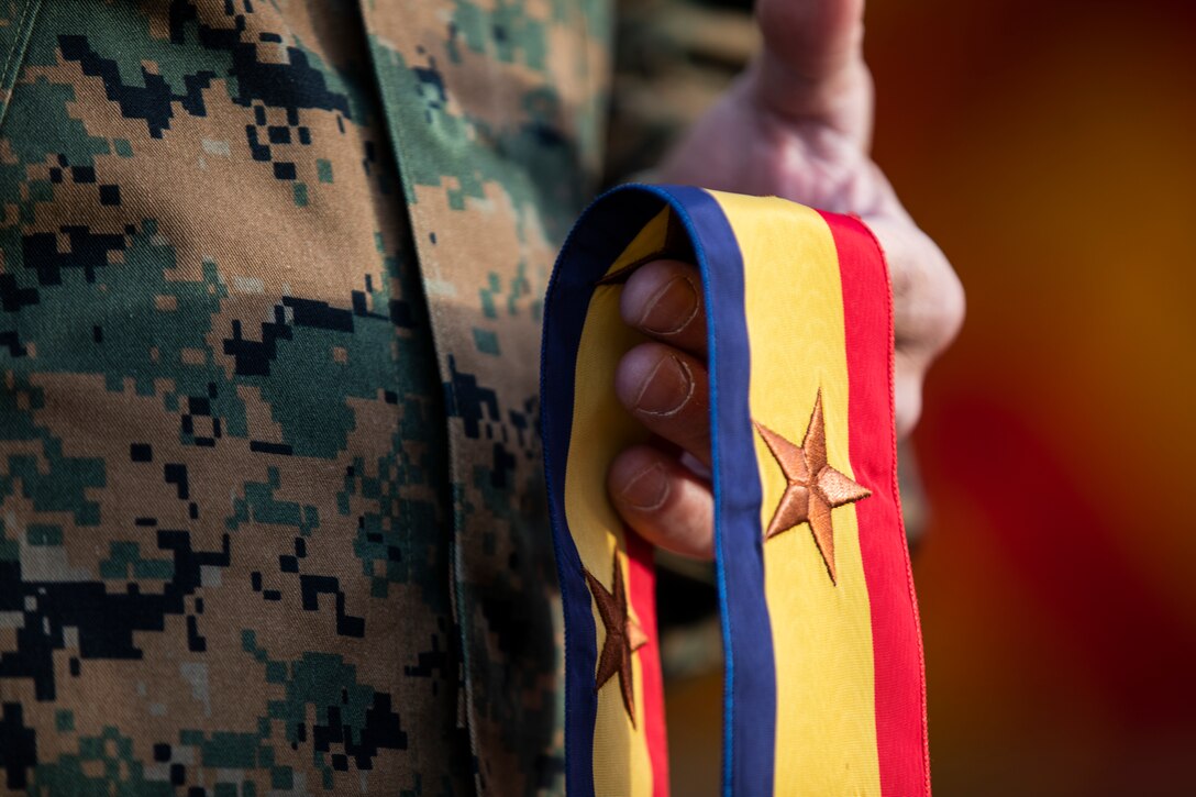 U.S. Marines with 11th Marine Regiment, 1st Marine Division, stand in formation prior to a battle colors ceremony at Marine Corps Base Camp Pendleton, California, Jan. 12, 2022. Veterans and active duty Marines and Sailors attended the annual ceremony to pay tribute to the Marines that have served with the regiment. (U.S. Marine Corps photo by Sgt. Hannah Hall)