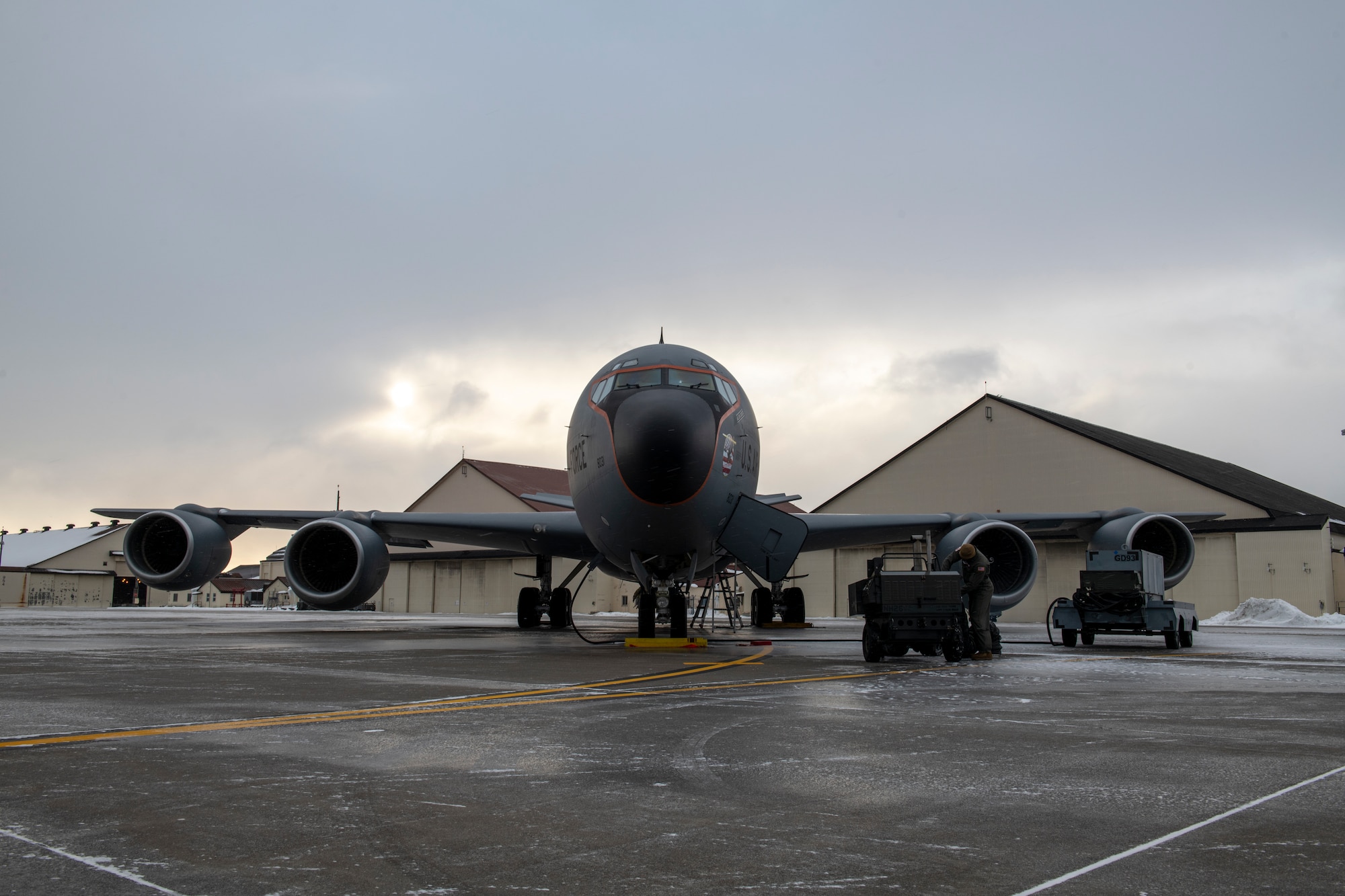 Airmen from the 909th Air Refueling Squadron conduct pre-flight inspections before departing from Misawa Air Base, Japan, Jan. 12, 2022. The 909th ARS supported a Bomber Task Force mission, with the Japan Air Self-Defense Force aircraft.(U.S. Air Force photo by Airman 1st Class Moses Taylor)