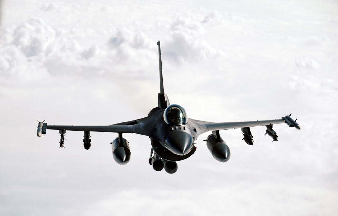 A U.S. Air Force F-16 Fighting Falcon flies over the U.S. Central Command area of responsibility