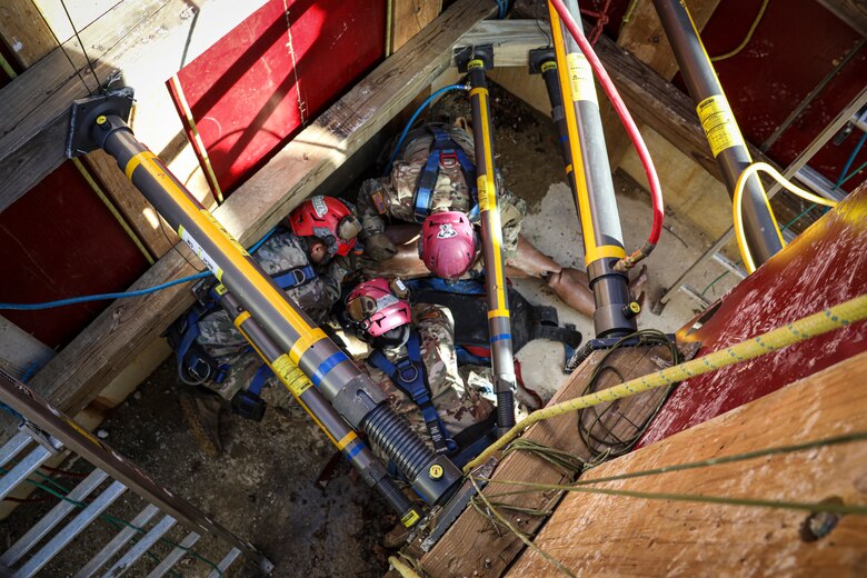 District of Columbia, (Jan 11, 2022) – U.S. Marines from Chemical Biological Incident Response Force (CBIRF) along with U.S. Army Soldiers from the 911th Technical Rescue Engineer Company participate in Joint technical rescue training using a trench trainer at the DC Fire Training Academy in Washington D.C. on January 11, 2022. CBIRF trains with various units and locations year-round in order to maintain maximum effectiveness for both the unit itself, and everyone else in the CBRNE mission set. Technical rescue is a vital component of CBRNE response, as Marines and Soldiers could potentially have to stabilize structures to provide aid. (Official U.S. Marine Corps photo by Gunnery Sgt. Kristian S. Karsten/Released)