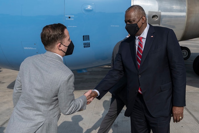 Language Enabled Airman Program Scholar and Foreign Area Officer Maj. Timothy Bettis shakes hands with Secretary of Defense Lloyd Austin during Secretary Austin’s visit to the 2021 Manama Dialogue, the largest security conference in the Middle East. Maj. Bettis provided language and tactical support to the U.S. embassy for the event.