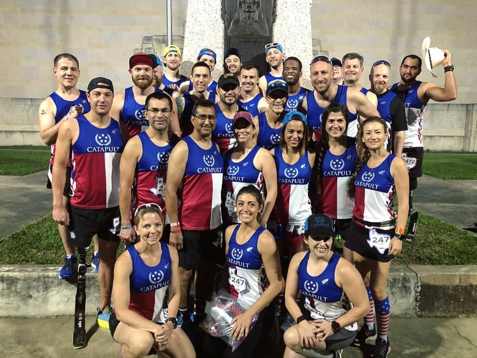 Staff Sgt. Stuart Martin, 68th Airlift Squadron loadmaster, with the CATAPULT group, after a 200-mile relay from Gonzales, Texas to downtown Houston, July 4, 2019. The CATAPULT group was founded in 2015 for a group of like-minded Houston-area triathletes and runners. After his recovery from his motorcycle accident, Martin participated in several marathons. (Courtesy photo)