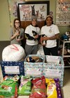 Sgt. Maj. Andy Hardy, Master Sgt. Conchetta McCregg, and Sgt. 1st Class Mikaela Clark, members of the Rock Island Arsenal Sergeant Audie Murphy Club, conducted a two-week pet rescue donation drive for King's Harvest Pet Rescue No Kill Shelter, located in Davenport, Iowa.