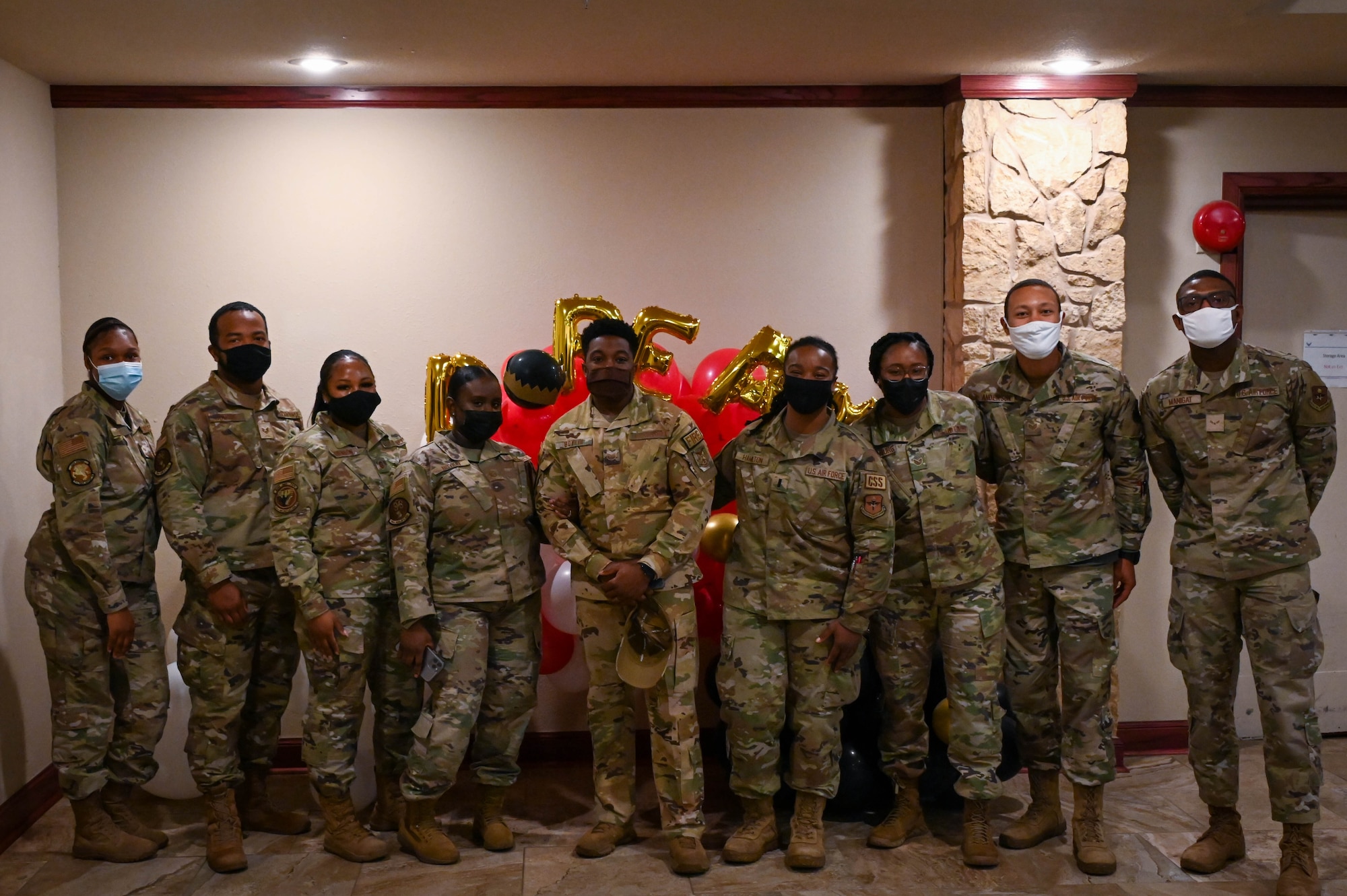 Airmen participating in the Martin Luther King Day Jr. breakfast pose for a photo at Altus Air Force Base, Oklahoma, January 14, 2022. There were approximately 50 attendees at the event. (U.S. Air Force photo by Senior Airman Kayla Christenson)