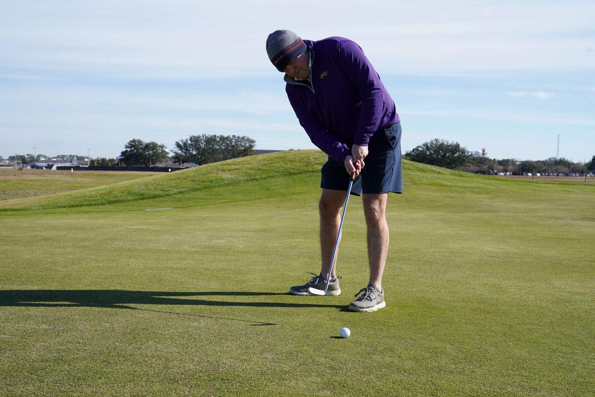 U.S. Air Force Lt. Col. Jacob Simpson, 81st Training Wing Individual Mobilization Augmentee to the Staff Judge Advocate, putts during the Combined Federal Campaign Closeout Golf Scramble at the Bay Breeze Golf Course on Keesler Air Force Base, Mississippi, Jan. 14, 2021. Keesler held a closeout golf scramble for golf enthusiasts on base and in the community to raise money and celebrate the campaign. (U.S. Air Force photo by Senior Airman Seth Haddix)