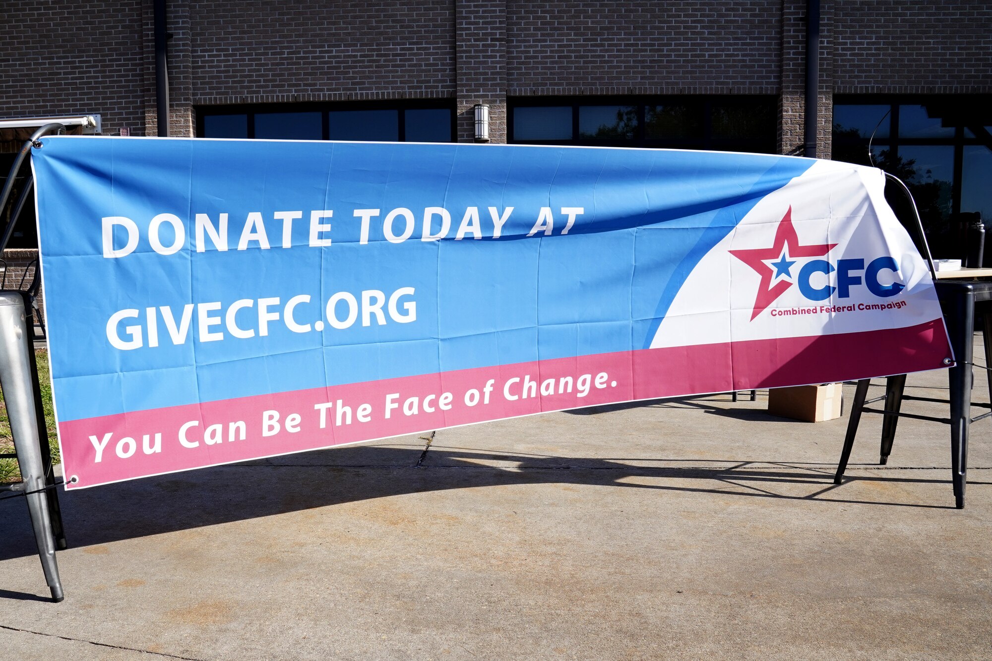 A Combined Federal Campaign donation banner is displayed outside the Bay Breeze Event Center at Keesler Air Force Base, Mississippi, Jan. 14, 2021. Keesler held a closeout golf scramble for golf enthusiasts on base and in the community to raise money and celebrate the campaign. (U.S. Air Force photo by Senior Airman Seth Haddix)